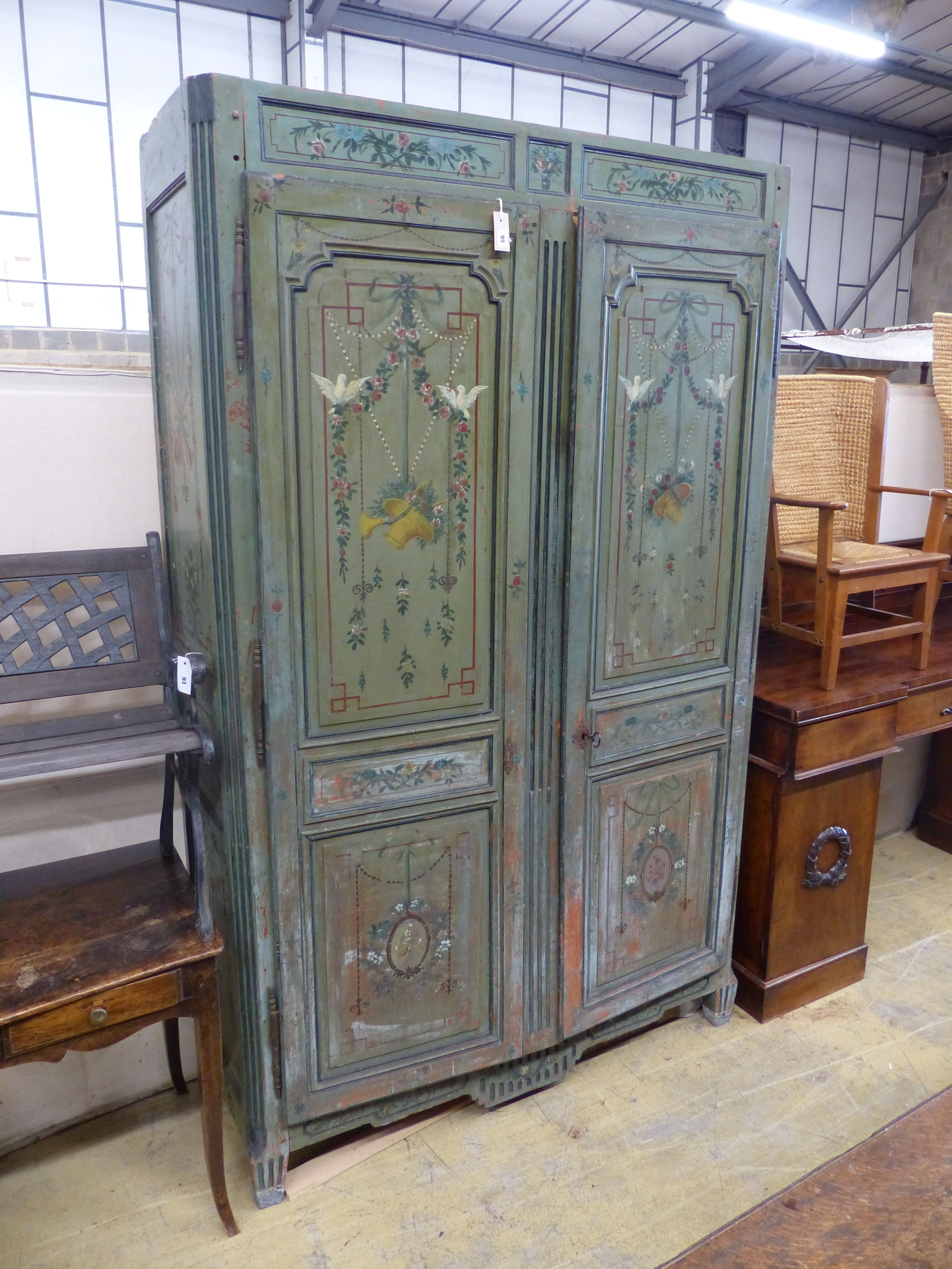 An 18th / early 19th century French later painted armoire, length 140cm, depth 50cm, height 227cm